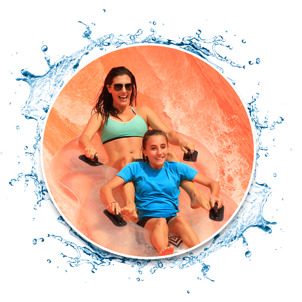 mother and daughter sliding on water tube