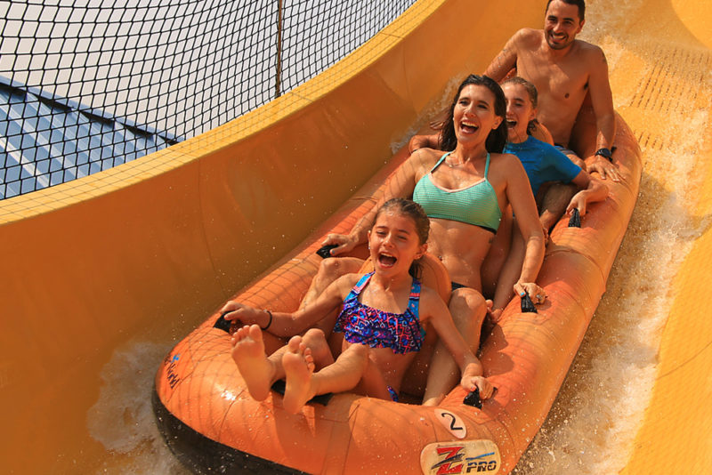 A family riding the Mile High Flyer